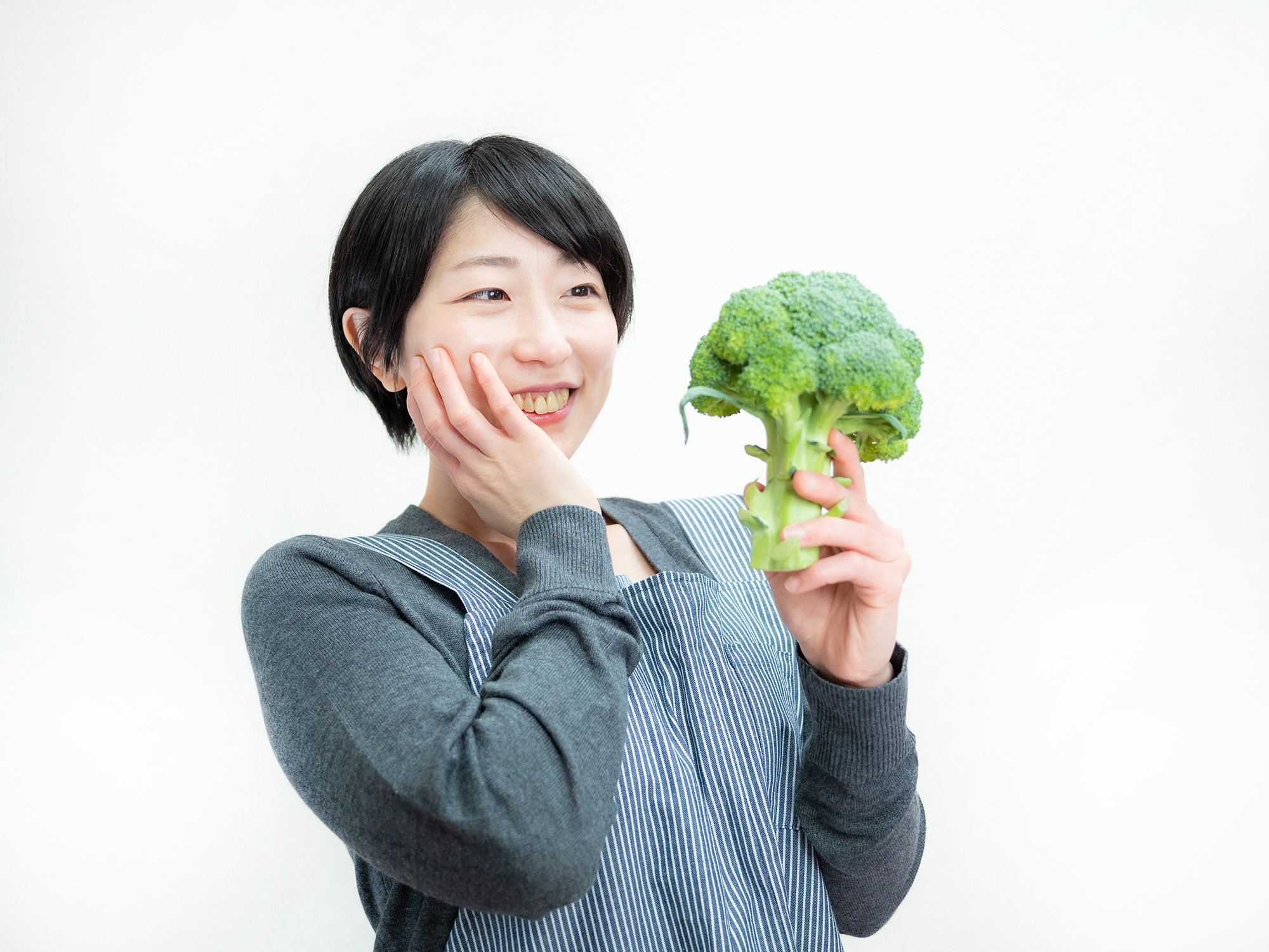 ブロッコリーと女性
